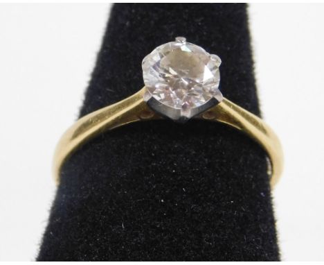 An 18ct gold diamond solitaire ring, with round brilliant cut diamond approx 0.86cts, in platinum claw setting, with pierced 