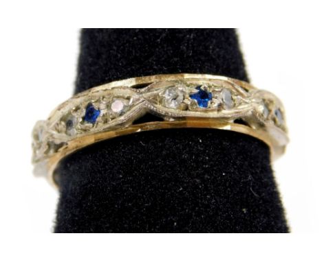 A 9ct gold and silver eternity ring, set with blue and white paste stones, ring size N, 2g all in. 