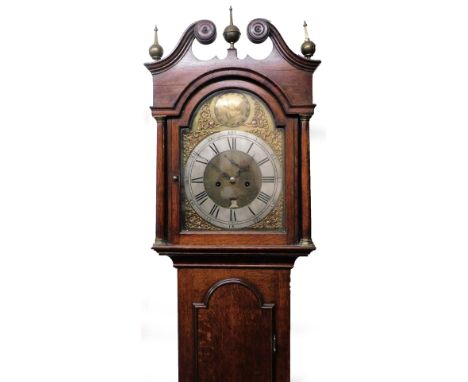 John Higdon Wells.  A 18thC oak Masonic longcase clock, the swan neck pedimented hood raised above a long arch trunk door, on