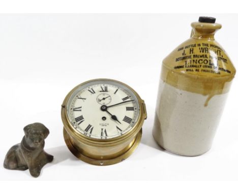 A 20thC Smith Empire brass bulkhead clock, of plain cylindrical form, with 14cm Dia. Roman numeric dial, subsidiary second ha