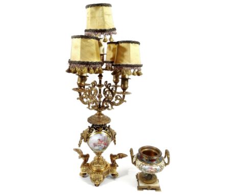 A late 19thC enamel gilt metal vase, the bellied circular body flanked by two acanthus capped handles, with an upper banding 