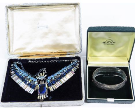 Two items of jewellery, to include a Victorian silver bangle, with etched floral design, in retailer Buler fitted box, and a 