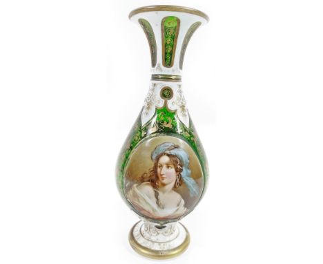 A 19thC Bohemian green flash glass vase,  the trumpet stem with milk glass section picked out with gilt highlighted green pan