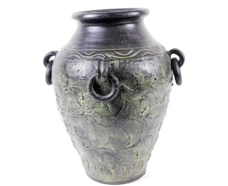 A large pottery Lioa vase, of shouldered circular form, sgraffito decorated with ring handles, impressed marks beneath, 54cm 