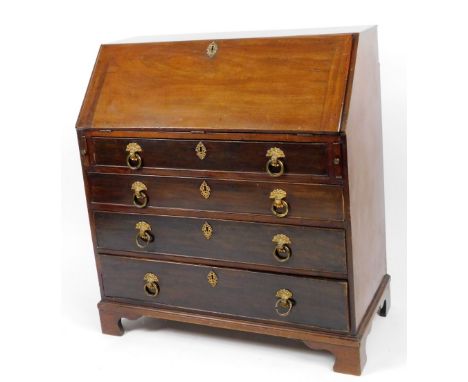 A George III mahogany bureau, the fall revealing a fitted interior above loafers and four long cockbeaded drawers terminating