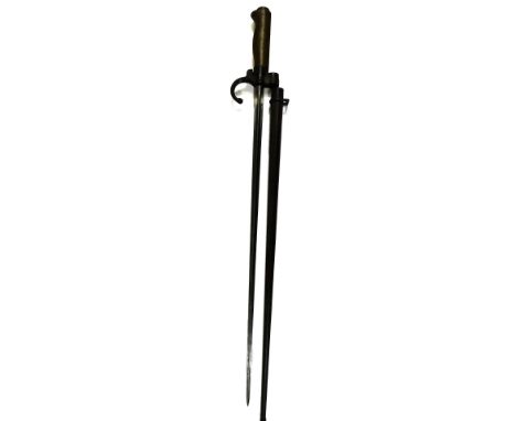 An early 20thC bayonet and scabbard, with shaped cylindrical blade no. 20889, 66cm W.