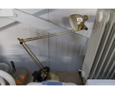 An angle poise lamp