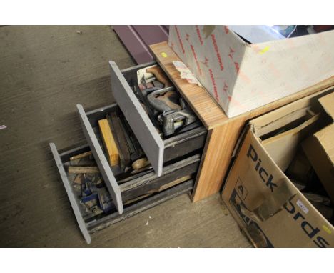 A wooden two drawer chest and contents of various hand tools etc. 