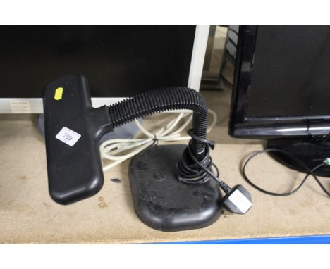 An adjustable desk lamp