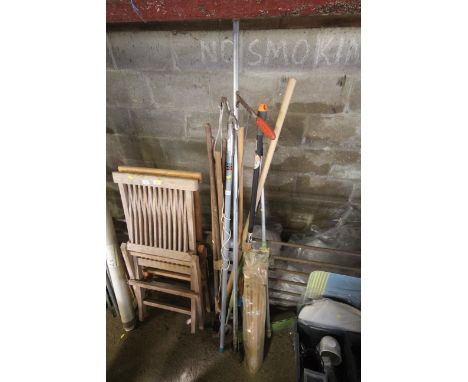 A quantity of long handled tools to include branch loppers, hoes, rakes etc.