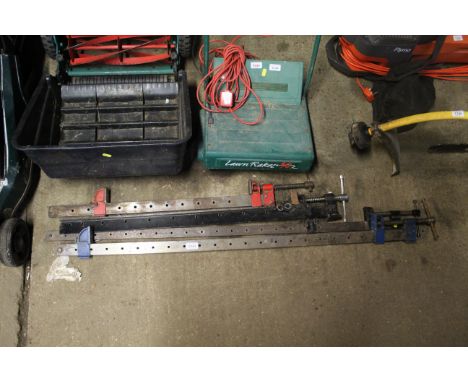 Four various sash clamps 