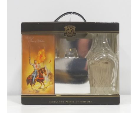 CHIVAS REGAL 12YO WITH DECANTER
A boxed set of Chivas Regal 12 Year Old Blended Scotch Whisky together with a Stuart Crystal 