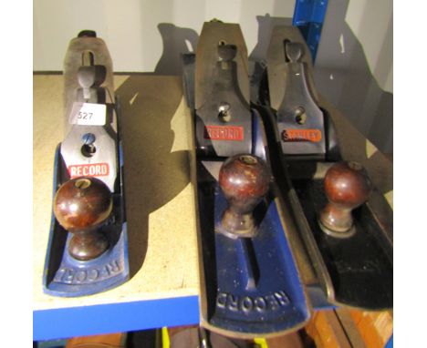 A Record No 8 bench plane, a Record No 5 smoothing plane and a Stanley No 7 bench plane, (3).