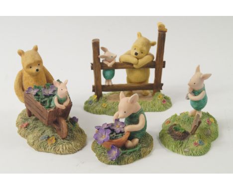 Four Border Fine Arts sculptures, boxed, comprising Pooh & Piglet leaning over fence, Piglet with Trowel, Piglet with Violets