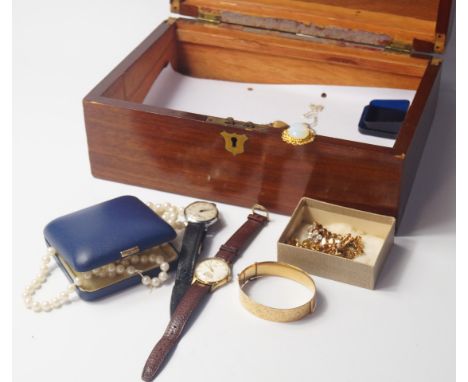 A Victorian mahogany box containing costume jewellery and watches, including two Smith's gentleman's wristwatches, paste neck