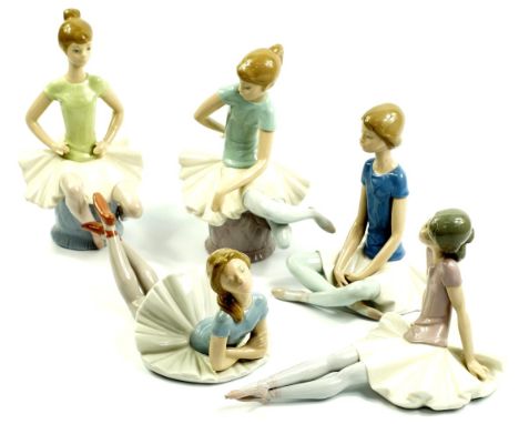Five Lladro porcelain figures of ballerinas, each modelled in a seated or recumbent pose, printed marks (5).