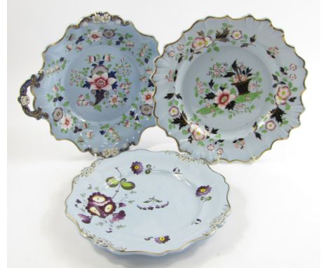 An early 19thC Ridgways dessert dish, decorated with flowers against a turquoise body, and two plates, similarly decorated, (
