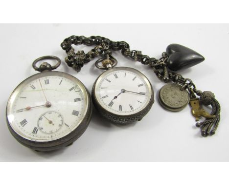 A lady's silver cased open faced pocket watch, keyless wind, enamel dial bearing Roman numerals, Swiss movement, foliate engr