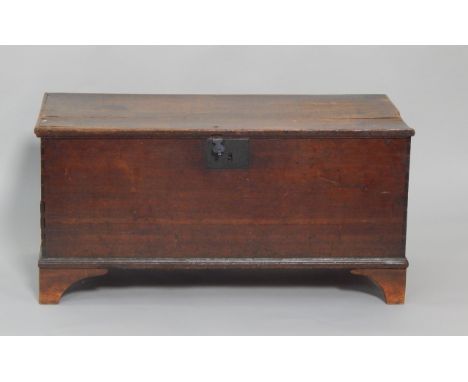 An 18thC oak coffer raised on bracket feet, 96cm x 45.5cm x 46.5cm, (A/F).