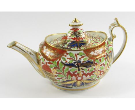 A Chamberlains Worcester early 19thC porcelain teapot, boat shaped with an Imari decoration of flowers, pattern No 276.