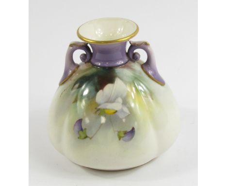 A Hadleys Worcester porcelain vase painted with flowers by H Martin, signed, circa 1907, of twin handled, lobed form, printed