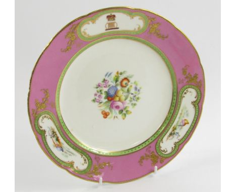 A Coalport early 19thC porcelain plate, painted with fruit and flowers, reserves of birds and crest and coronet for the Marqu