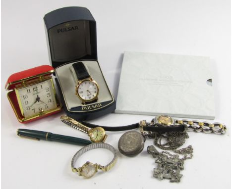 An Avia lady's 9ct gold hexagonal cased wristwatch, circular dial bearing Arabic numerals, on a leather strap, a Continental 