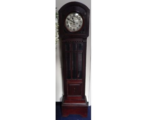 An early 20thC oak grandmother clock, silvered dial bearing Arabic numerals, eight day movement with quarter strike Westminst