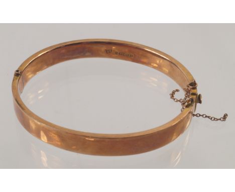 A 9ct gold hinged bangle, 5.2g.