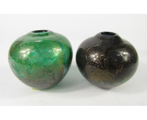 Two Michael Harris Isle of Wight Azurene globe vases, one green, the other black, black triangle labels, 7cm high. 