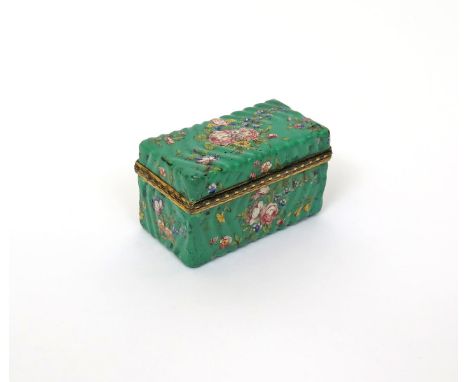A small rectangular enamel snuff box, early 19th century, perhaps London, moulded with herringbone flutes, painted with flowe