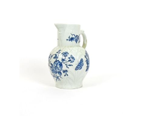 A large Worcester blue and white cabbage leaf jug, c.1765, printed with the rare Heavy Naturalistic Floral design, open cresc