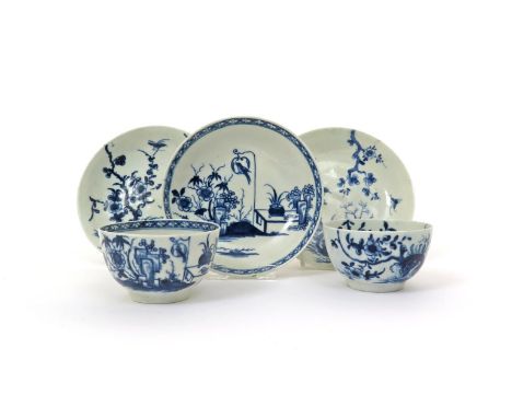 Two Worcester blue and white teabowls and saucers, c.1765-70, one painted with the Bird in a Ring pattern, the other with the