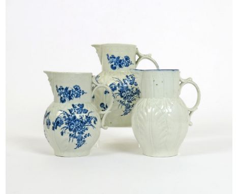 Two Worcester blue and white cabbage leaf jugs, c.1775, printed with the Bouquets pattern, hatched crescent marks, and a Caug