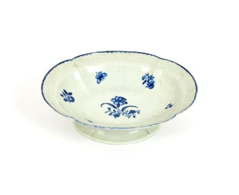 A Worcester low footed blue and white tazza, c.1770, the quatre-lobed well printed with the Gillyflower pattern, the rim with