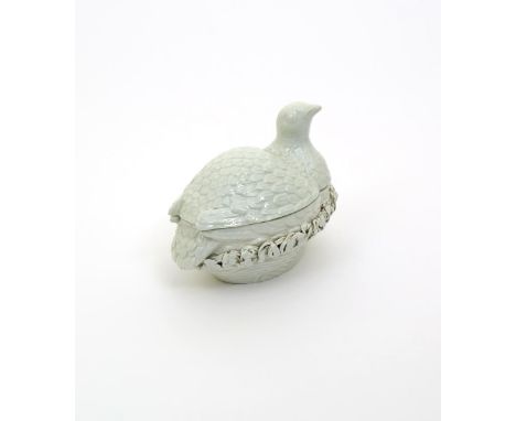 A Worcester partridge tureen and cover, c.1765, naturalistically moulded with incised feathers, the base with an applied band