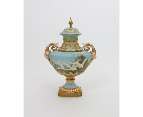 A large Royal Worcester vase and matched cover, date code for 1903, of shape 1575, painted by Charles Baldwyn with four swans