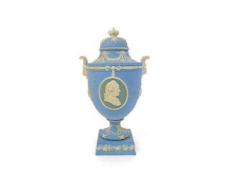 A Wedgwood tricolour Jasperware commemorative vase and cover of Australian interest, late19th/early 20th century, one side wi