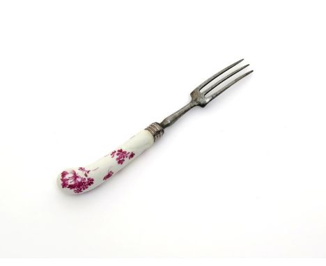 A Worcester fork handle, c.1765-75, possibly decorated in the Giles atelier, the pistol grip form painted in the Meissen mann