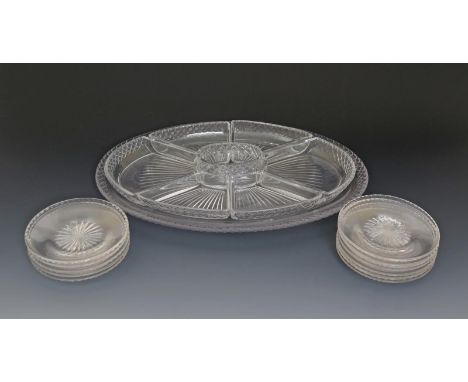 A glass sweetmeat stand or supper set, the oval stand set with seven cut glass dishes, together with twelve small glass plate