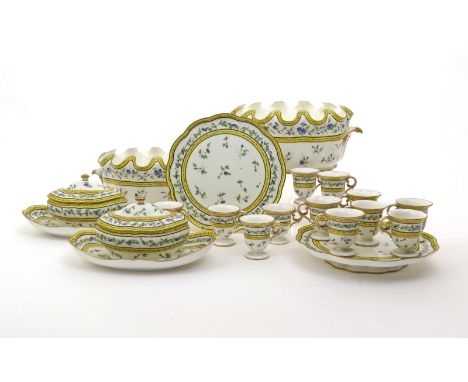 A Sèvres part dessert service, c.1788, decorated with continuous bands of blue convolvulus between yellow borders, and with f