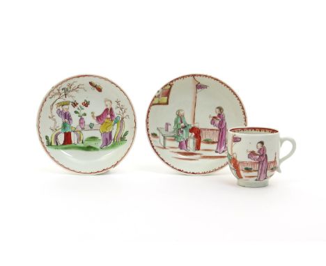 A Lowestoft coffee cup and saucer, c.1770-80, painted in polychrome enamels with two Chinese ladies and a small boy beside a 