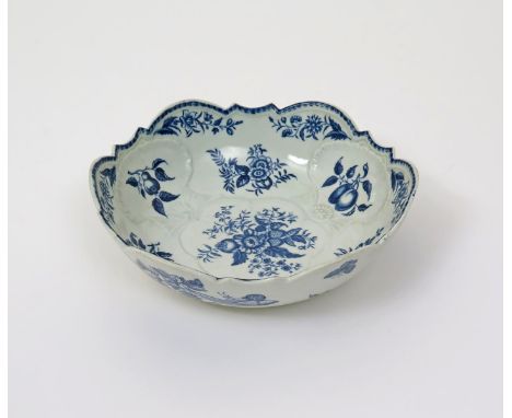 A large Worcester blue and white junket dish, c.1770, printed with the Pinecone pattern, the sides moulded with three scallop