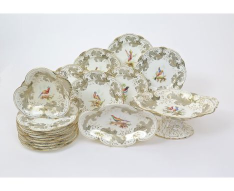 A Rockingham part dessert service, c.1830, the wells painted with colourful birds, reserved within large stylized grey leaves