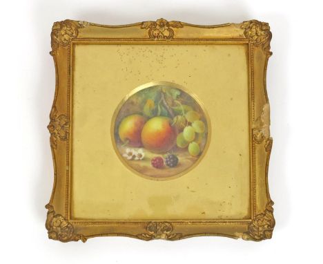 A Royal Worcester circular plaque, c.1920, cut from the centre of a plate, painted by Albert Shuck with apples, grapes and bl