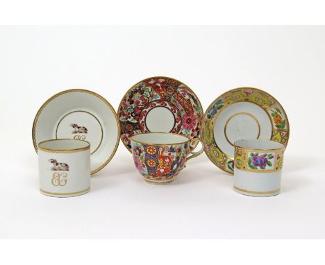 A Derby armorial coffee can and saucer, c.1790, painted with the crest of a recumbent dog above the gilt initials EC, puce fa
