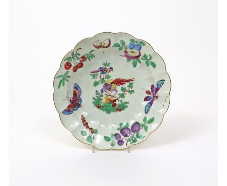 A good and large Worcester fluted dish, c.1768-70, decorated in the atelier of James Giles with two dishevelled birds perched
