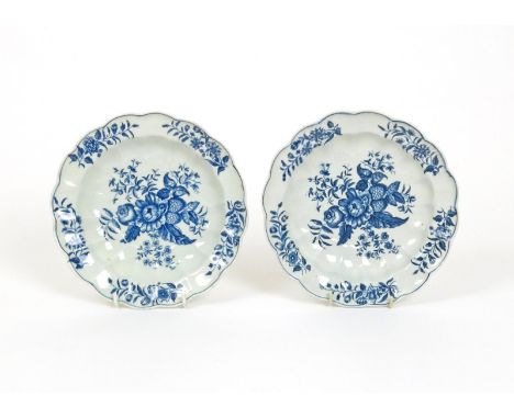 A pair of Worcester blue and white dishes, c.1775, printed with the Pinecone pattern, the lobed rims with five flower sprays,