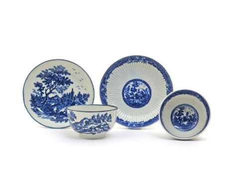 Two Worcester blue and white teabowls and saucers, c.1770, one printed with the European Landscape pattern of figures beside 