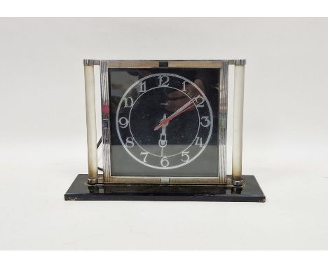 Hammond (USA) chrome-plated Art Deco-style electric mantel clock, the black dial with chrome arabic dial within engine-turned